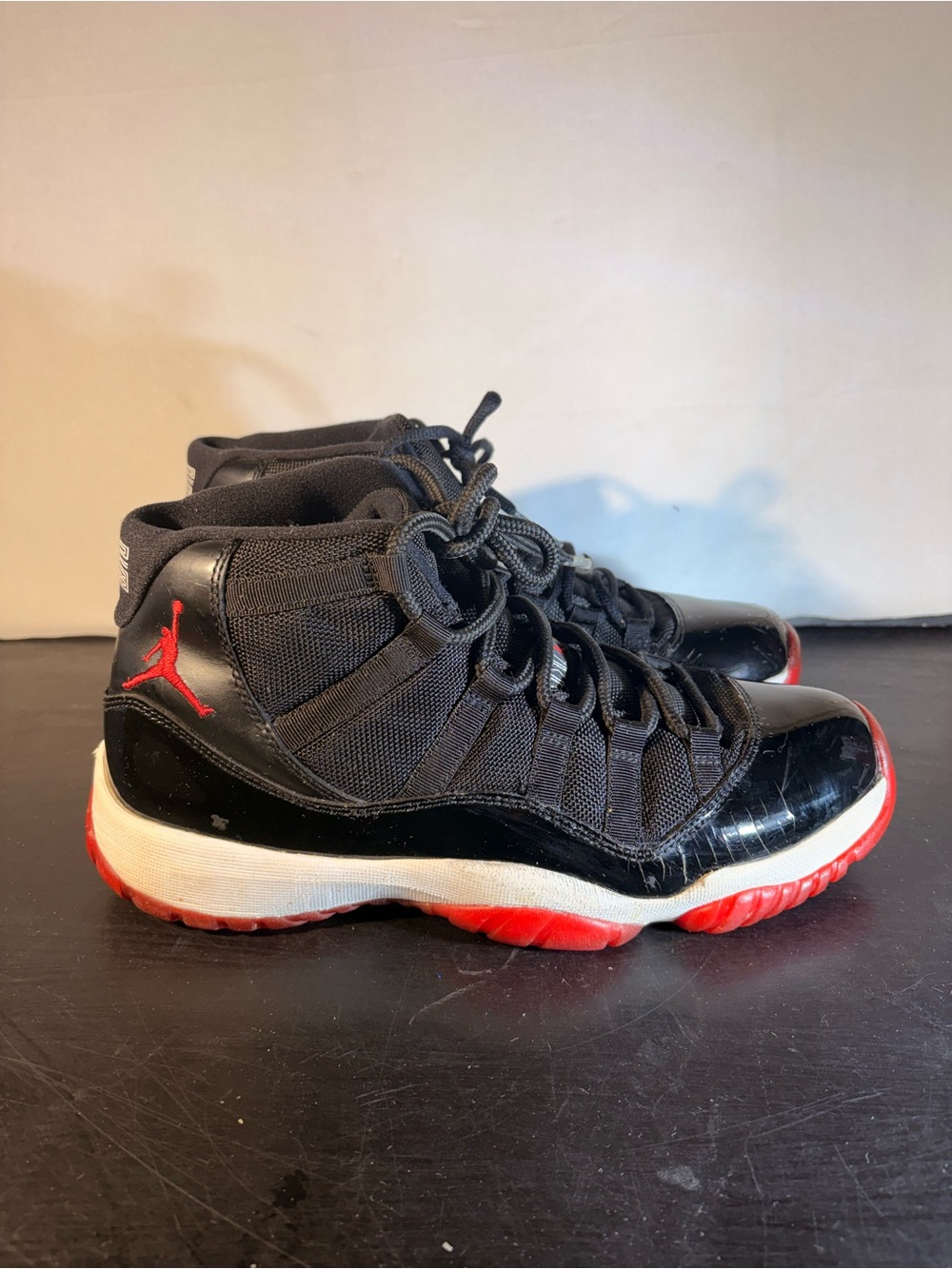 Jordan 11 Black and Red High-Top Sneakers